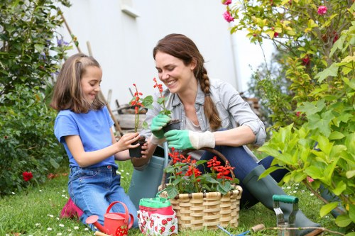 Gardening team safety briefing in a residential garden