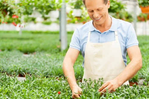 Gardener and client discussing garden layout with written notes
